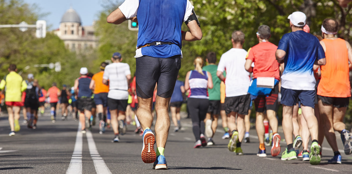 Runners Competing at Marathon Event